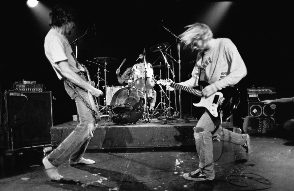 Nirvana playing on stage in 1990